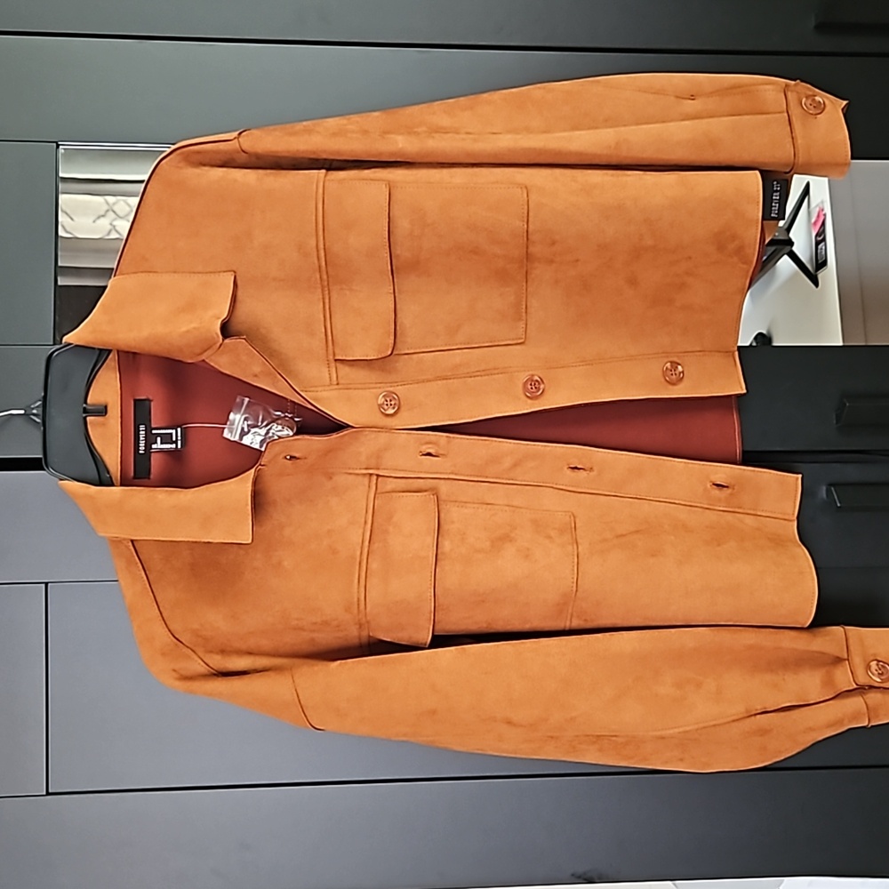 Ladies Oversized Shacket.    Medium...rust coloring never been worn